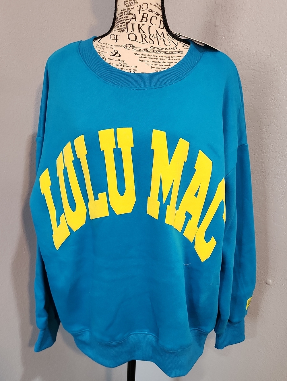 Lulu Mac Bright Blue Sweatshirt with Yellow Lettering.